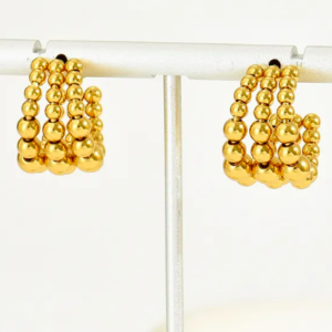 Aretes Chunky balines baño de oro 18 k.