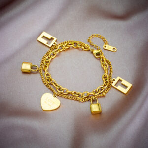 pulsera doble con dijes acero corazón titanio enchapado oro 18k